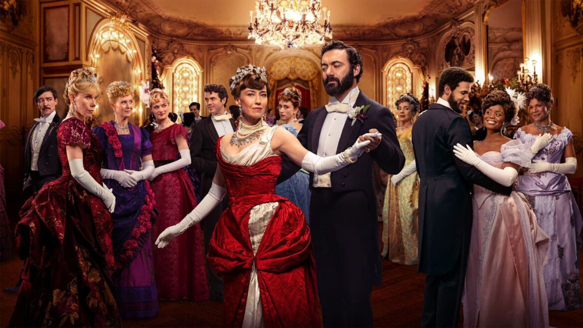 The cast of The Gilded Age look at each other across a ballroom