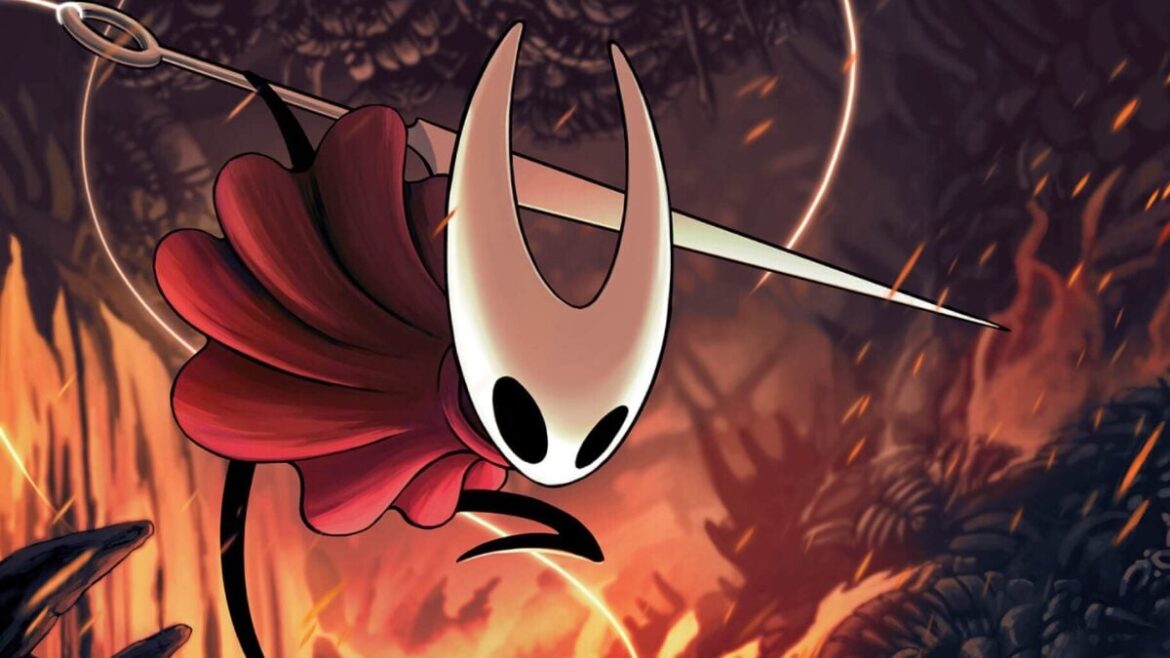 The main character of Hollow Knight jumps into a fiery light.