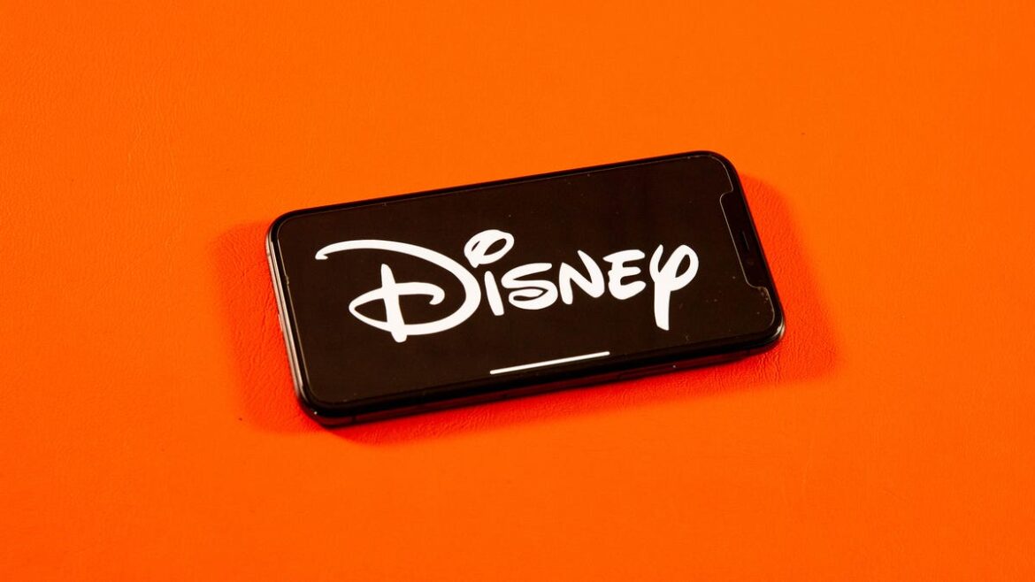 Disney Settles FTC Complaint With YouTube Over Children’s Data Collection Disney corporate logo on a phone screen