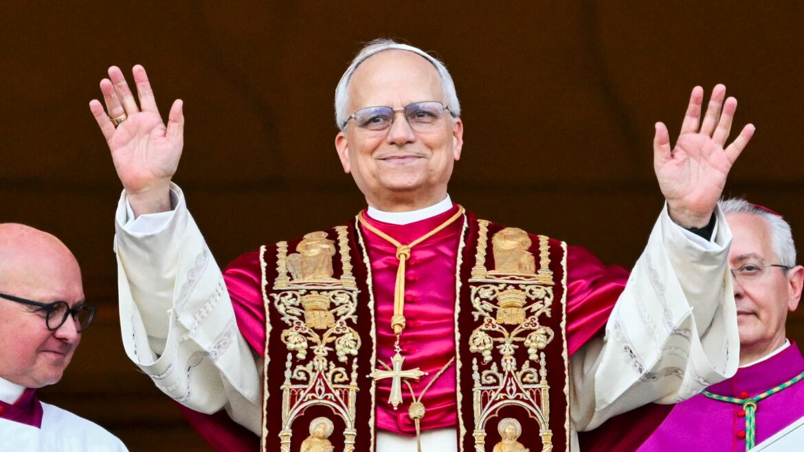 Pope Leo refuses to authorise an AI Pope and declares The newly elected Pope Leo waves to the Vatican crowd.