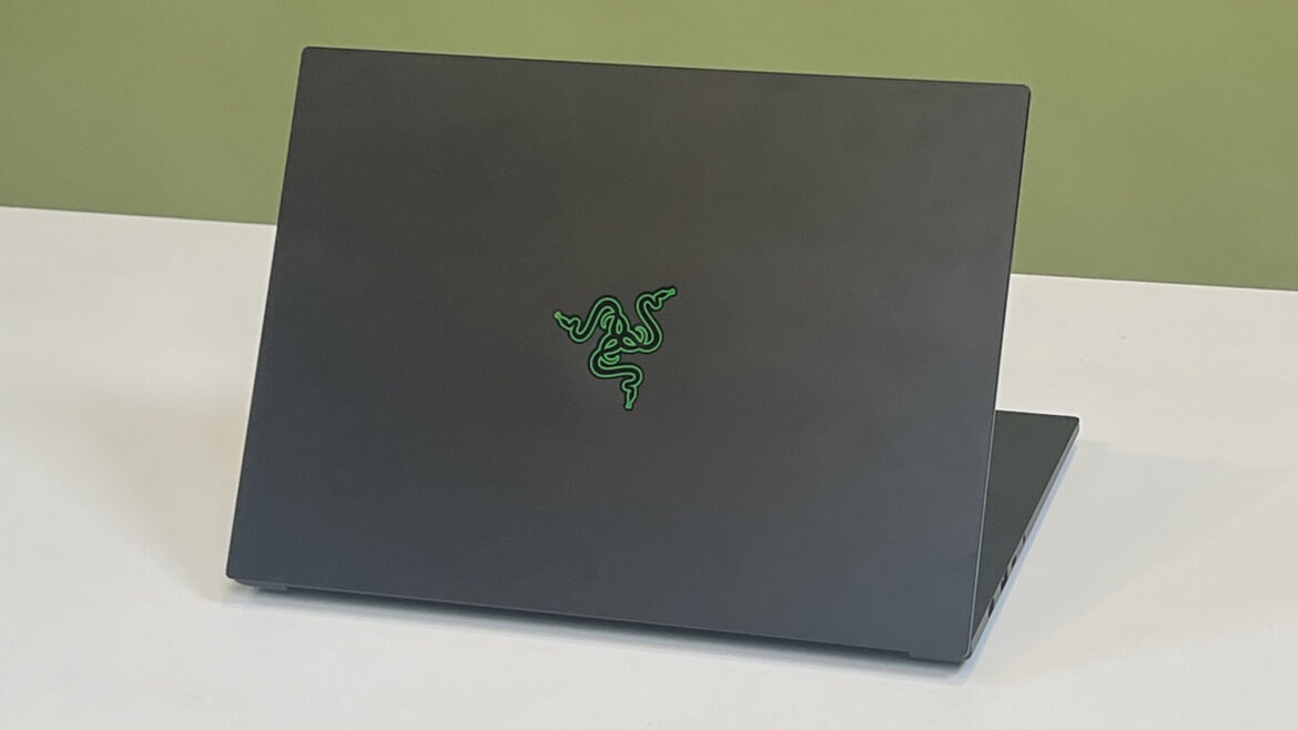 A Razer Blade 14 (2025) on a desk with its lid facing the viewer