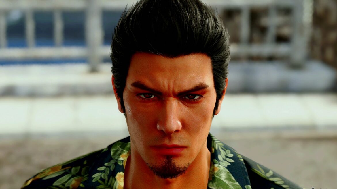 Kiryu looks into the middle distance, stoic.