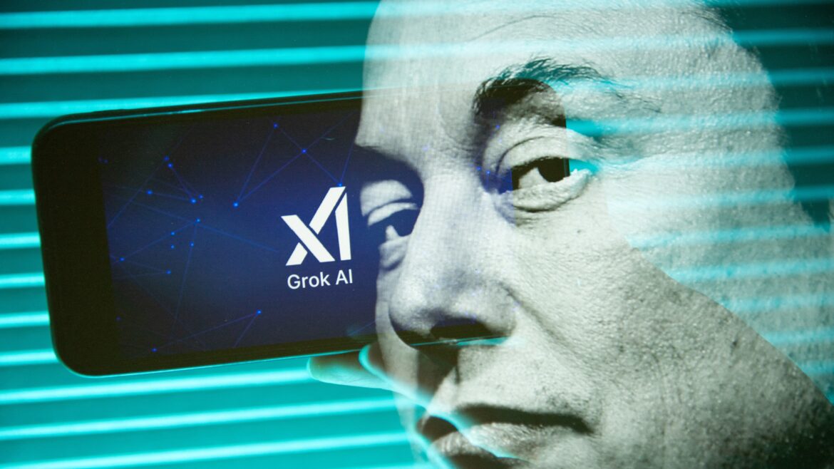 Elon Musk's face imposed over a phone displaying xAI's logo. 