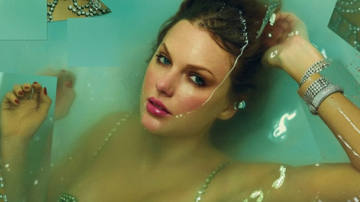 Taylor Swift laying in a tub of water.