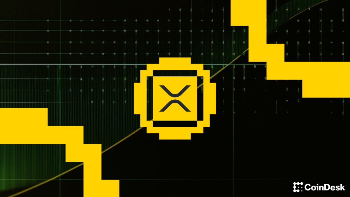 Coinbase logo shown on a laptop screen